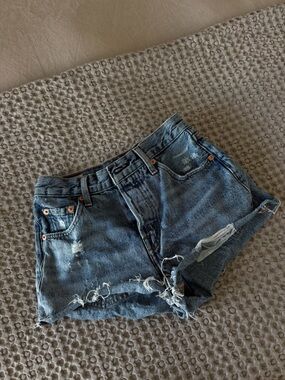 Levi's Distressed Medium Blue Denim Cutoff Shorts